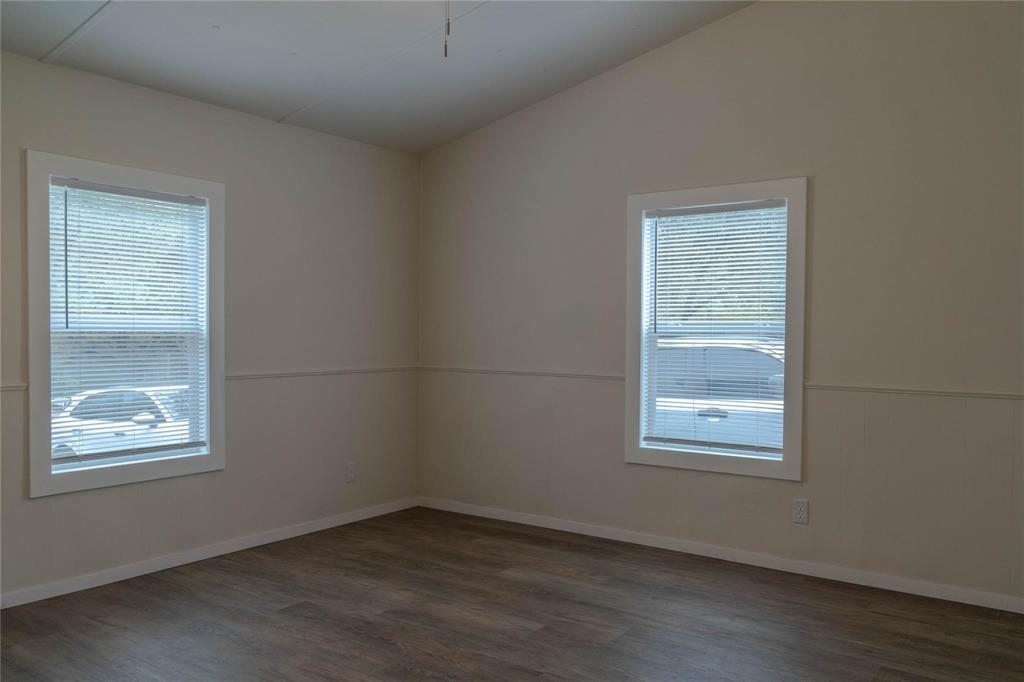 4817 Creekside Road Melissa, TX 75454 - Photo 10 of 10 an empty room with windows