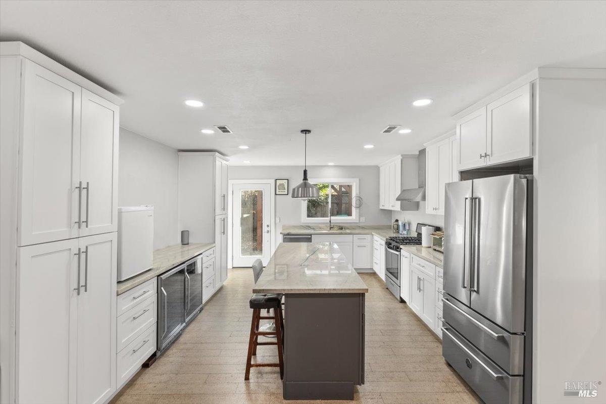 2239 Redwood Road, Unit ABC Napa, CA 94558 - Photo 9 of 20 The kitchen of House C (Orange Door). Each house has the same layout, however House C has the kitchen located in the middle of home, House A & B has he kitchen at entry. House A & B (Yellow and Green, use this room as a den, or dining room.