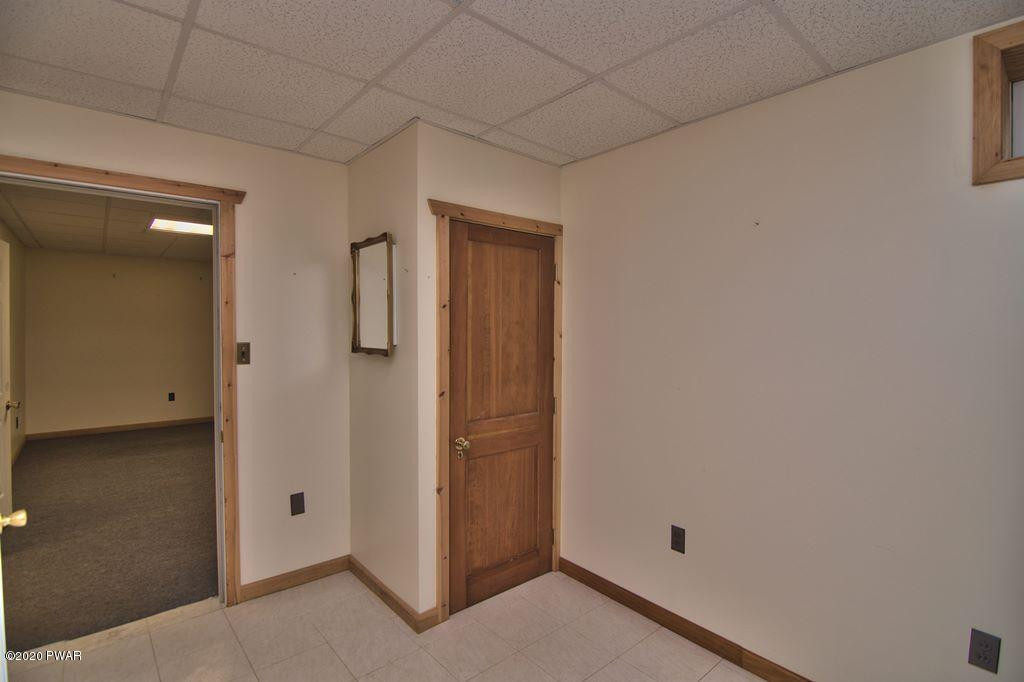 63 Callapoose Road Moscow, PA 18444 - Photo 42 of 73 an empty room with wooden floor and closet