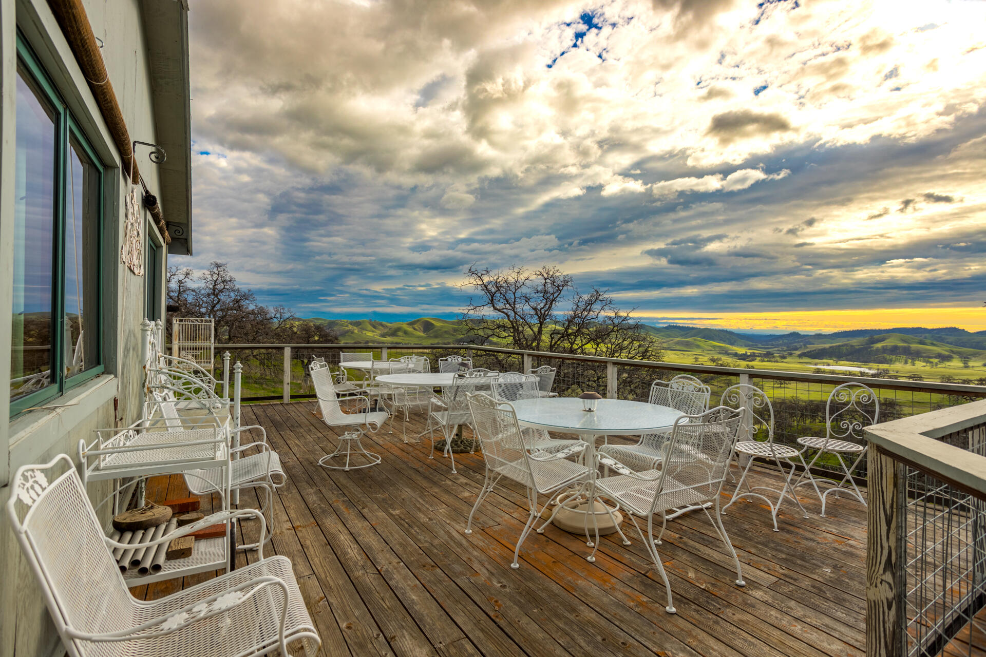 10333 Trinity Alps Vista Road Igo, CA 96047 - Photo 2 of 31 a view of a terrace with furniture and a kitchen