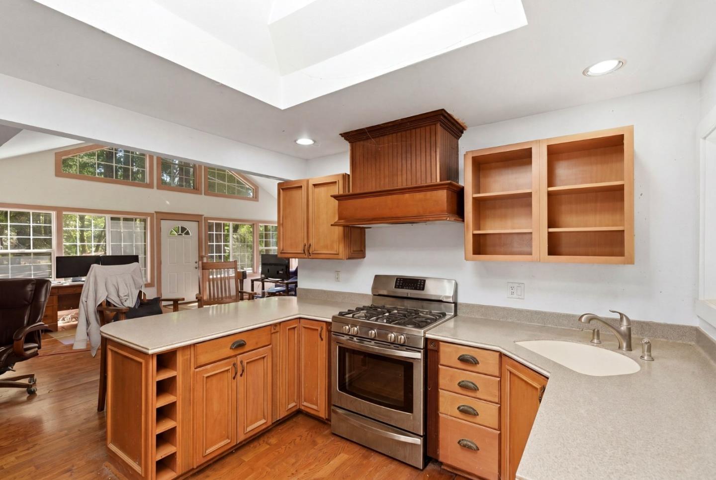 1460 Tucker Road Scotts Valley, CA 95066 - Photo 6 of 32 a kitchen with stainless steel appliances granite countertop a stove and a sink