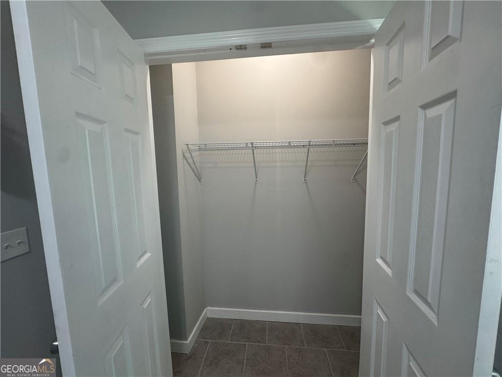 801 R Street Brunswick, GA 31520 - Photo 14 of 26 a bathroom with a glass shower door