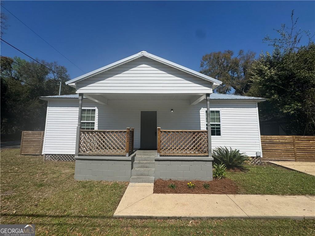 801 R Street Brunswick, GA 31520 - Photo 2 of 26 a front view of house with yard