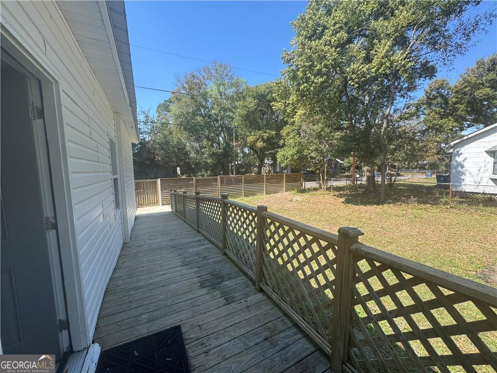 801 R Street Brunswick, GA 31520 - Photo 23 of 26 a view of a balcony with wooden floor