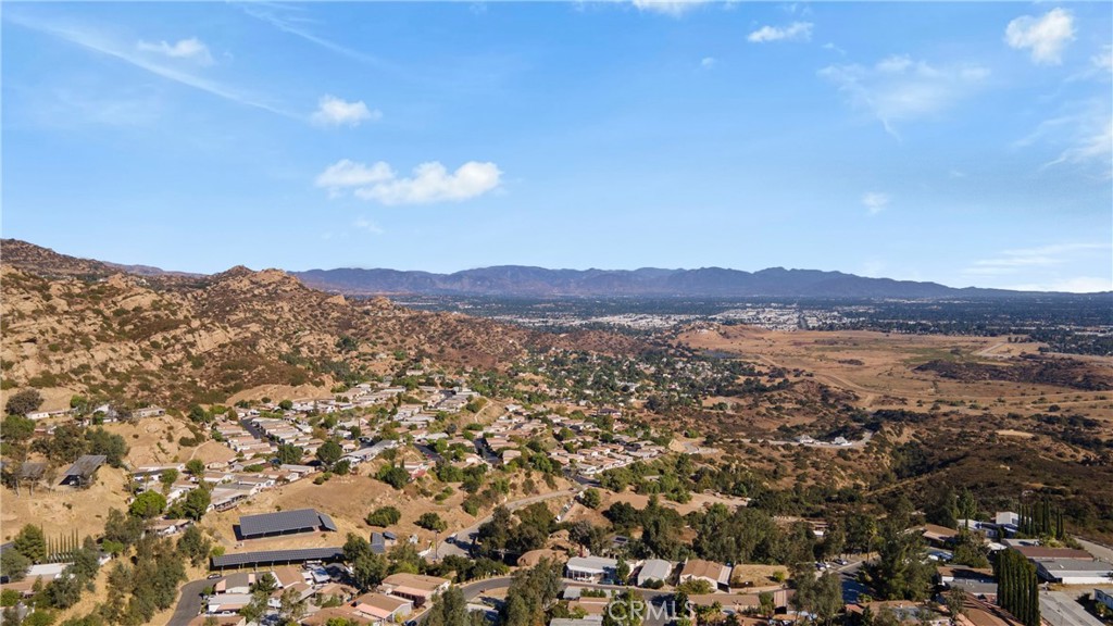 24303 Woolsey Canyon Road, Unit 85 West Hills, CA 91304 - Photo 30 of 31 an aerial view of residential house and outdoor space
