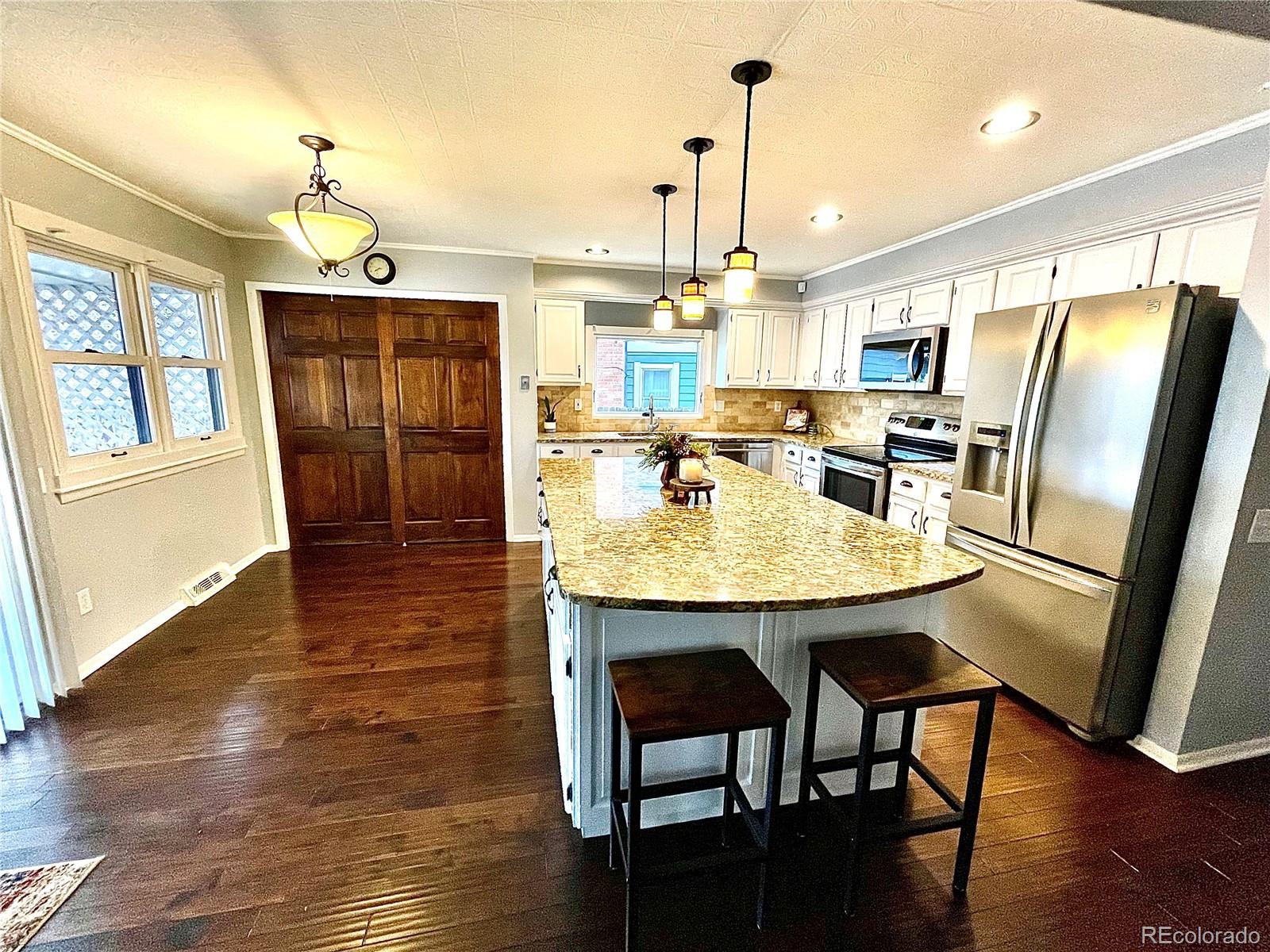 8240 South San Juan Range Road Littleton, CO 80127 - Photo 6 of 40