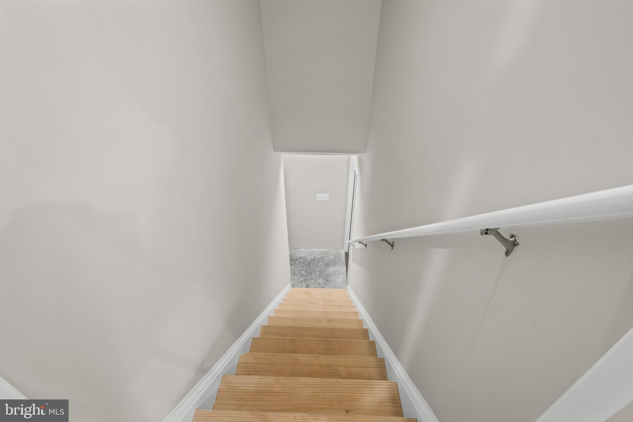 172 Martins Farm Road Front Royal, VA 22630 - Photo 12 of 22 a view of a hallway with wooden floor and staircase