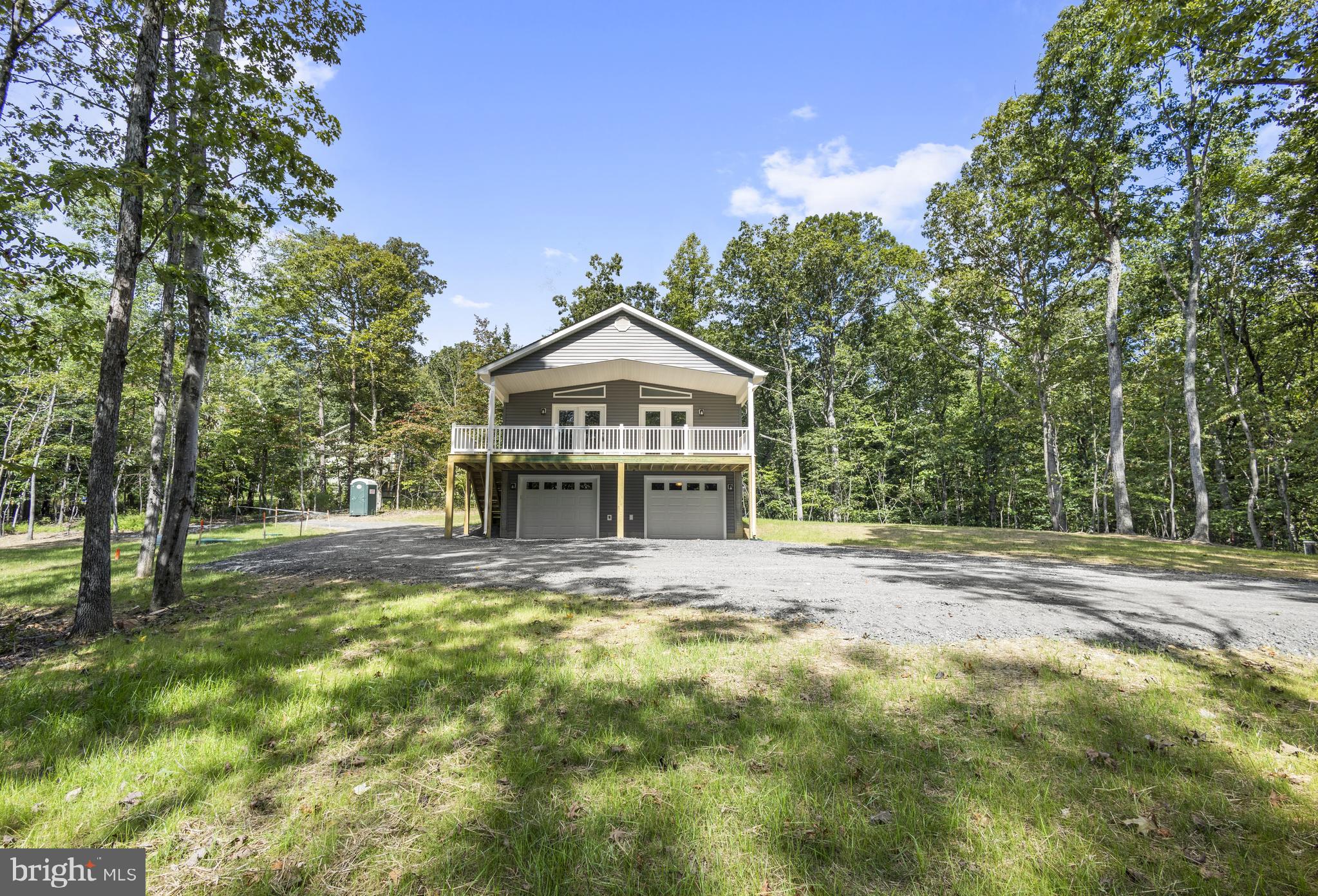 172 Martins Farm Road Front Royal, VA 22630 - Photo 17 of 22 a front view of a house with a yard