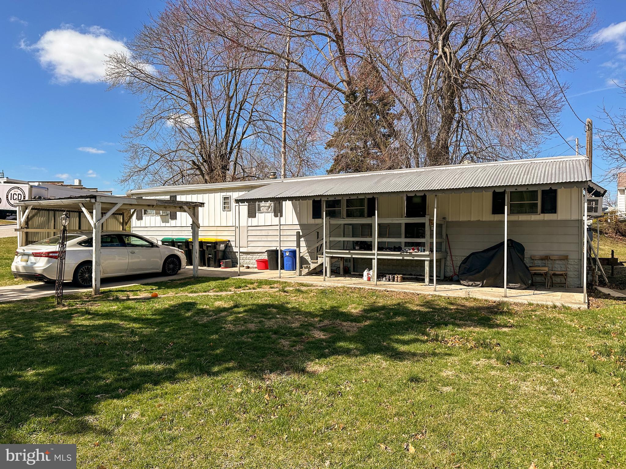12 Oneill Avenue Hanover, PA 17331 - Photo 1 of 14 a front view of a house with a garden and trees