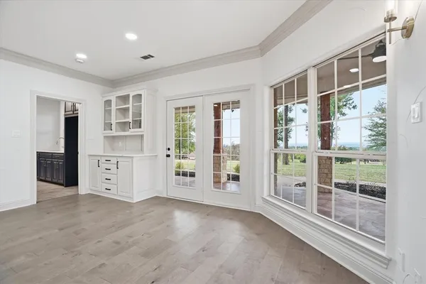 a view of livingroom with furniture window and front door