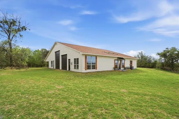 a house view with a garden space