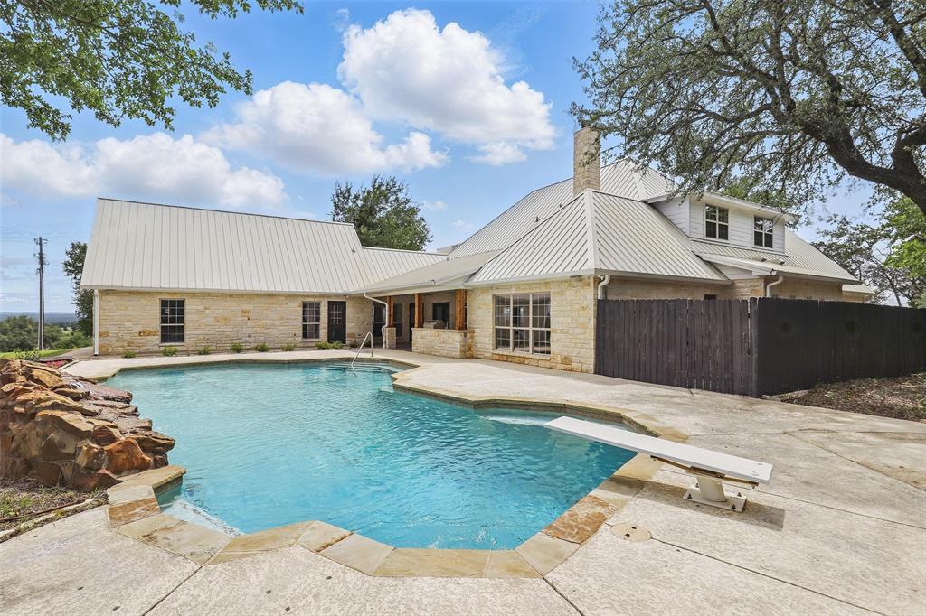 1430 Black Hawk Trail Nemo, TX 76070 - Photo 3 of 40 a front view of a house with garden