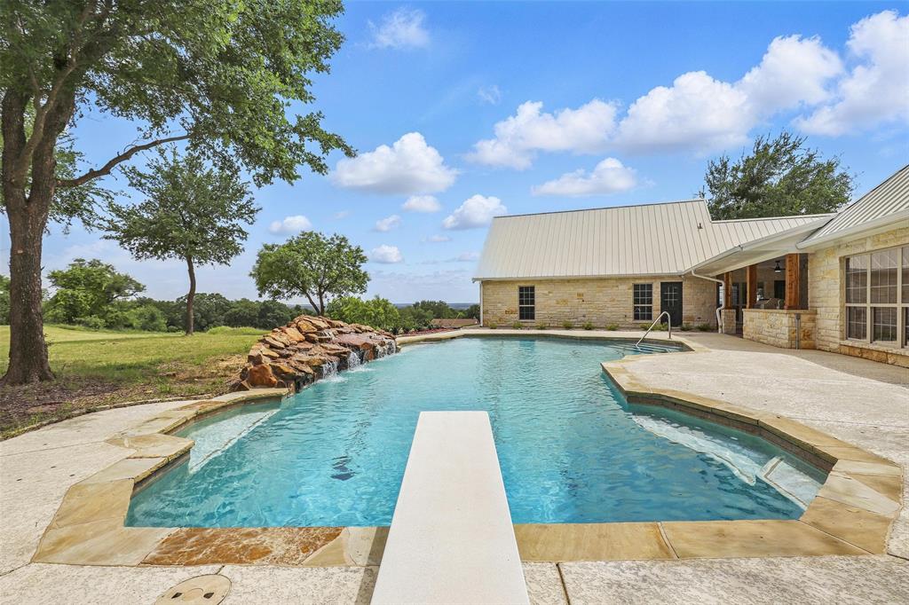 1430 Black Hawk Trail Nemo, TX 76070 - Photo 38 of 40 front view of a house with a yard