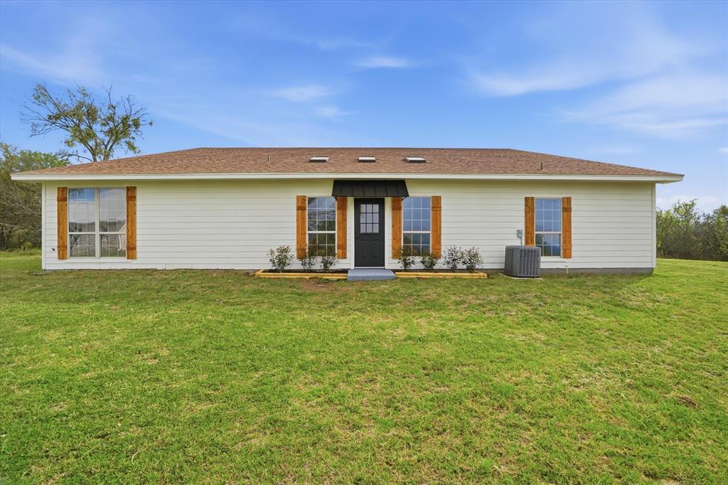 1430 Black Hawk Trail Nemo, TX 76070 - Photo 4 of 40 a house view with a garden space