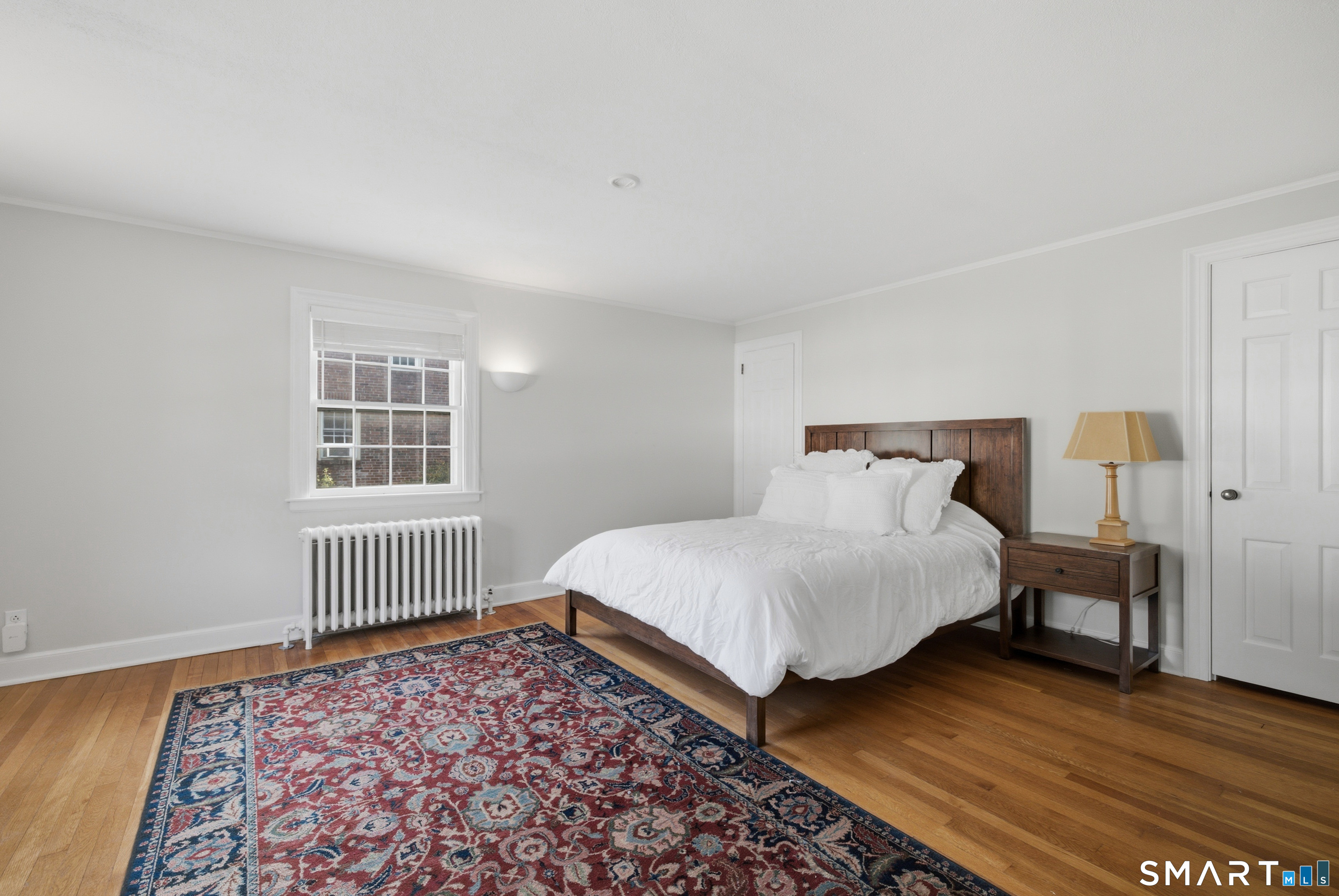 9 Stratford Road West Hartford, CT 06117 - Photo 19 of 40 A serene primary bedroom retreat is designed for everyday comfort
