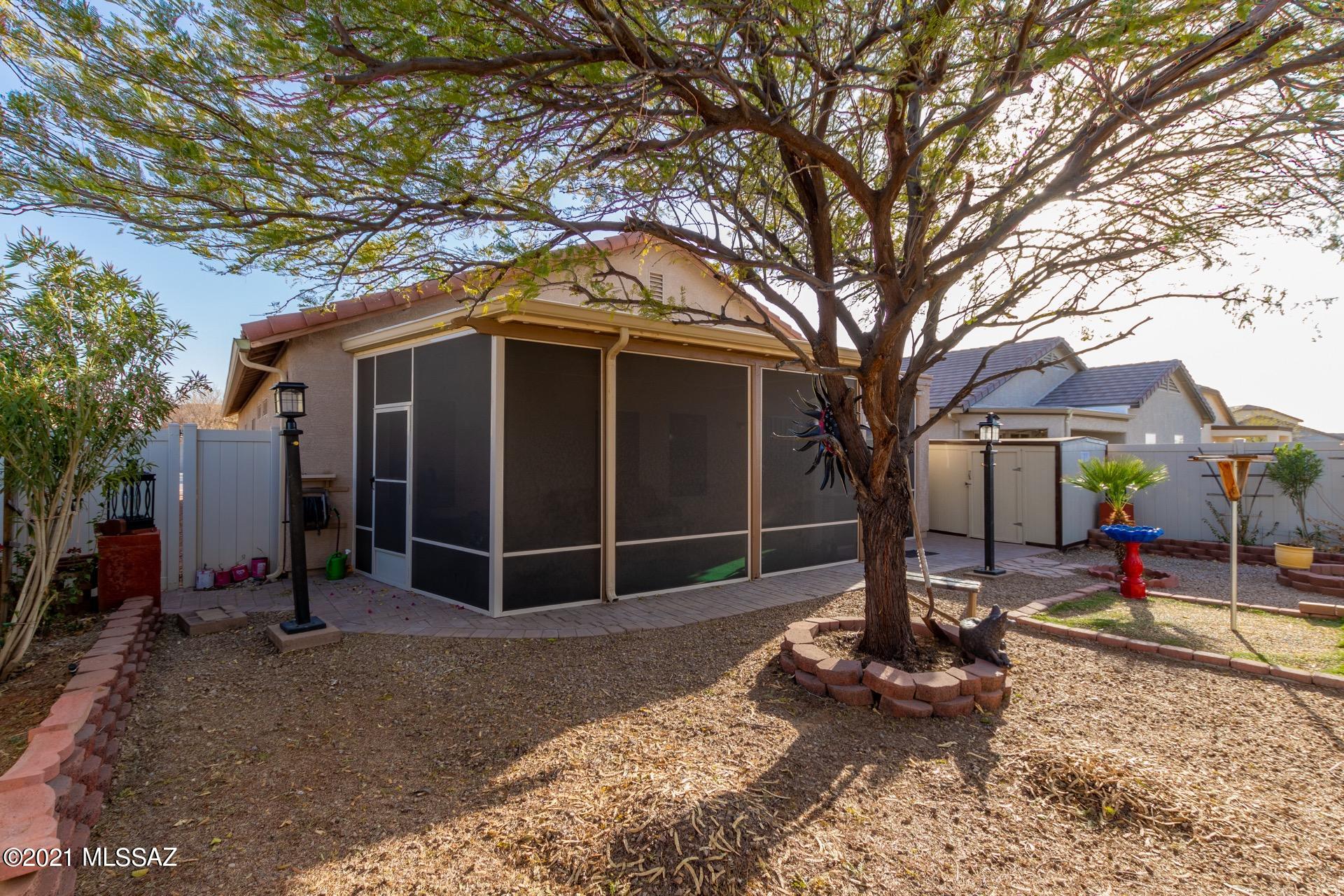 20894 East Founders Road Red Rock, AZ 85145 - Photo 27 of 27 a front view of a house with garden