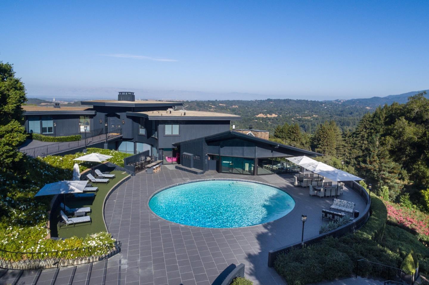 835 La Honda Road Woodside, CA 94062 - Photo 15 of 30 an aerial view of a house with outdoor space swimming pool and mountains
