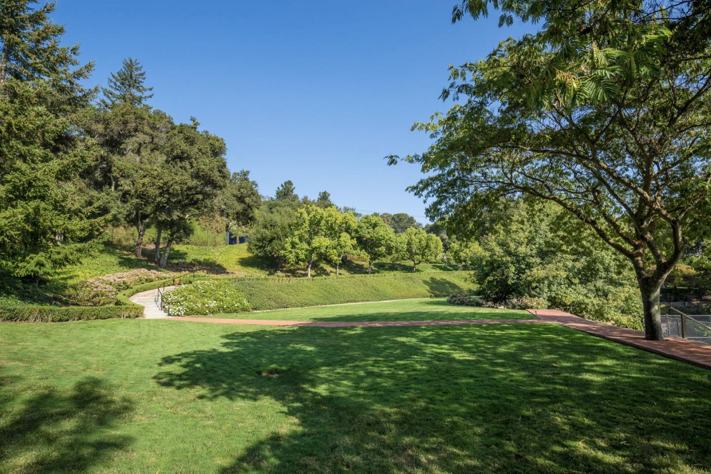 835 La Honda Road Woodside, CA 94062 - Photo 20 of 30 a yard with lots of green space and trees