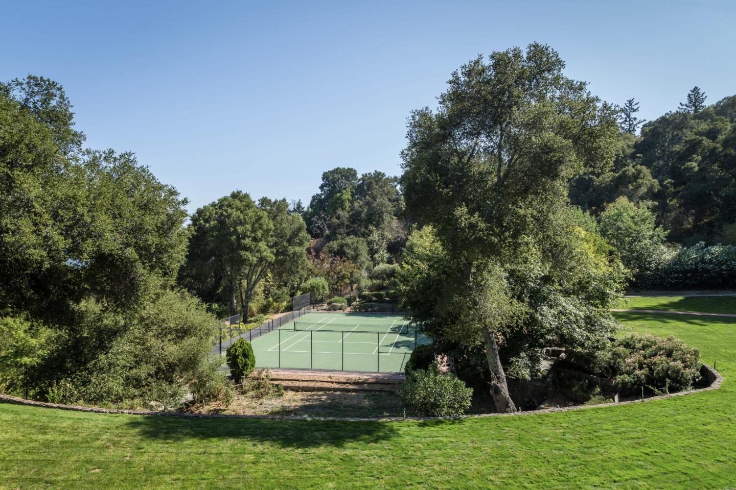 835 La Honda Road Woodside, CA 94062 - Photo 22 of 30 a view of a backyard with a garden