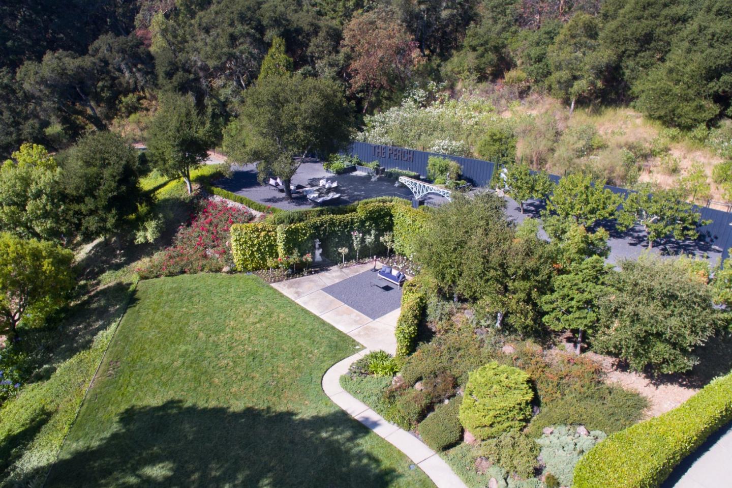 835 La Honda Road Woodside, CA 94062 - Photo 26 of 30 an aerial view of a house with a garden and plants