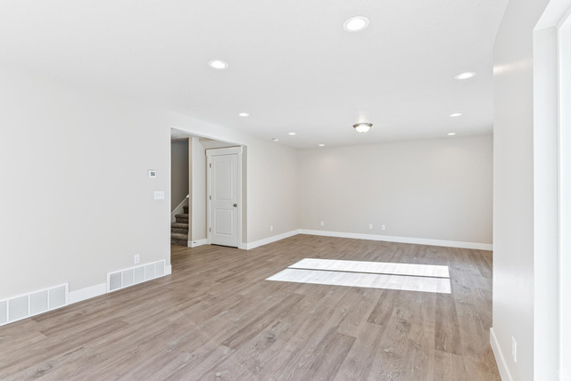 257 North Slant Road, Unit 51M Mapleton, UT 84660 - Photo 8 of 24 Spare room with recessed lighting and light wood-style flooring