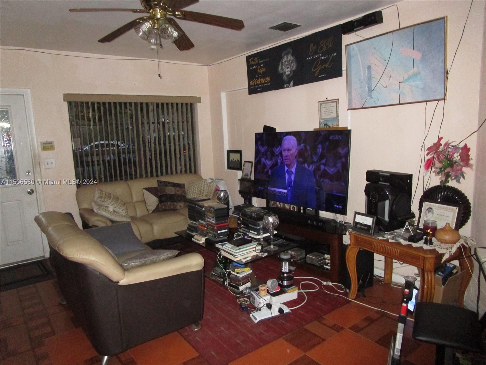 Westside North Miami, FL 33168 - Photo 12 of 13 a living room with furniture and wooden floor