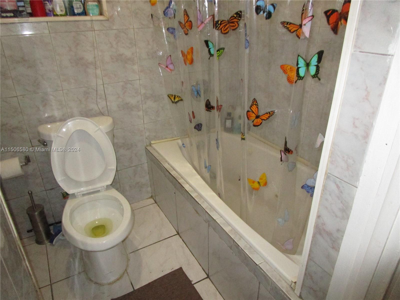 Westside North Miami, FL 33168 - Photo 7 of 13 a bathroom with a sink and toilet