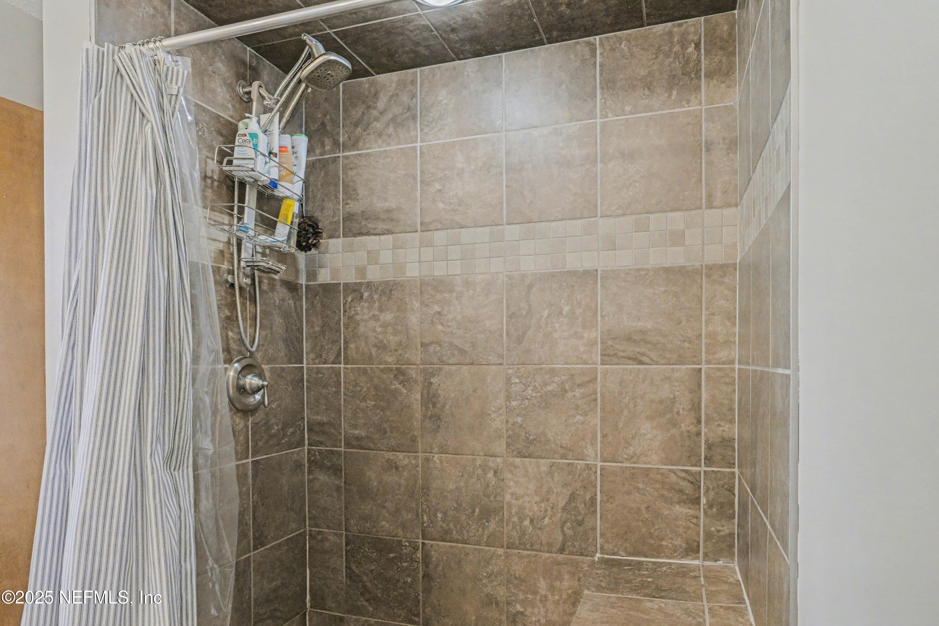 820 Golf Club Road Macclenny, FL 32063 - Photo 26 of 51 a bathroom with a shower