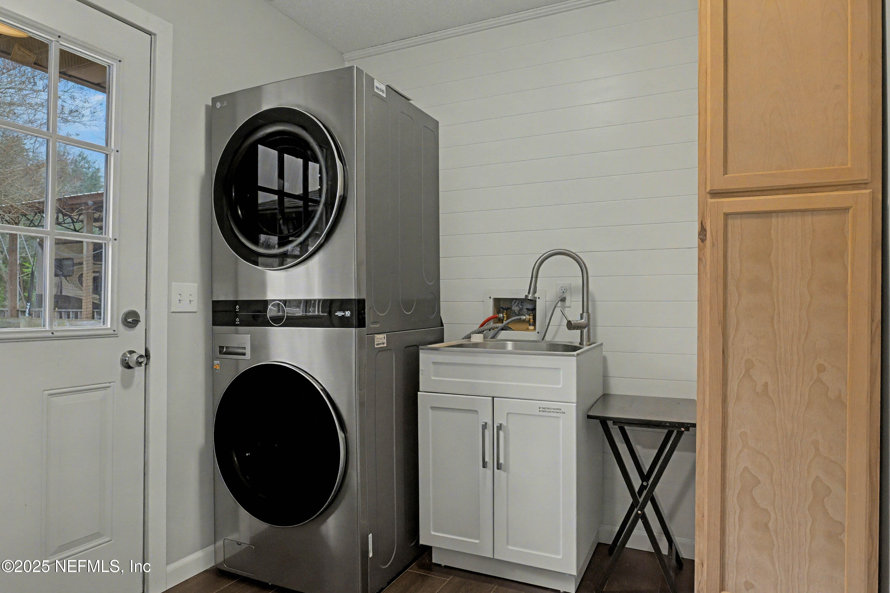 820 Golf Club Road Macclenny, FL 32063 - Photo 34 of 51 a room with a washer and dryer