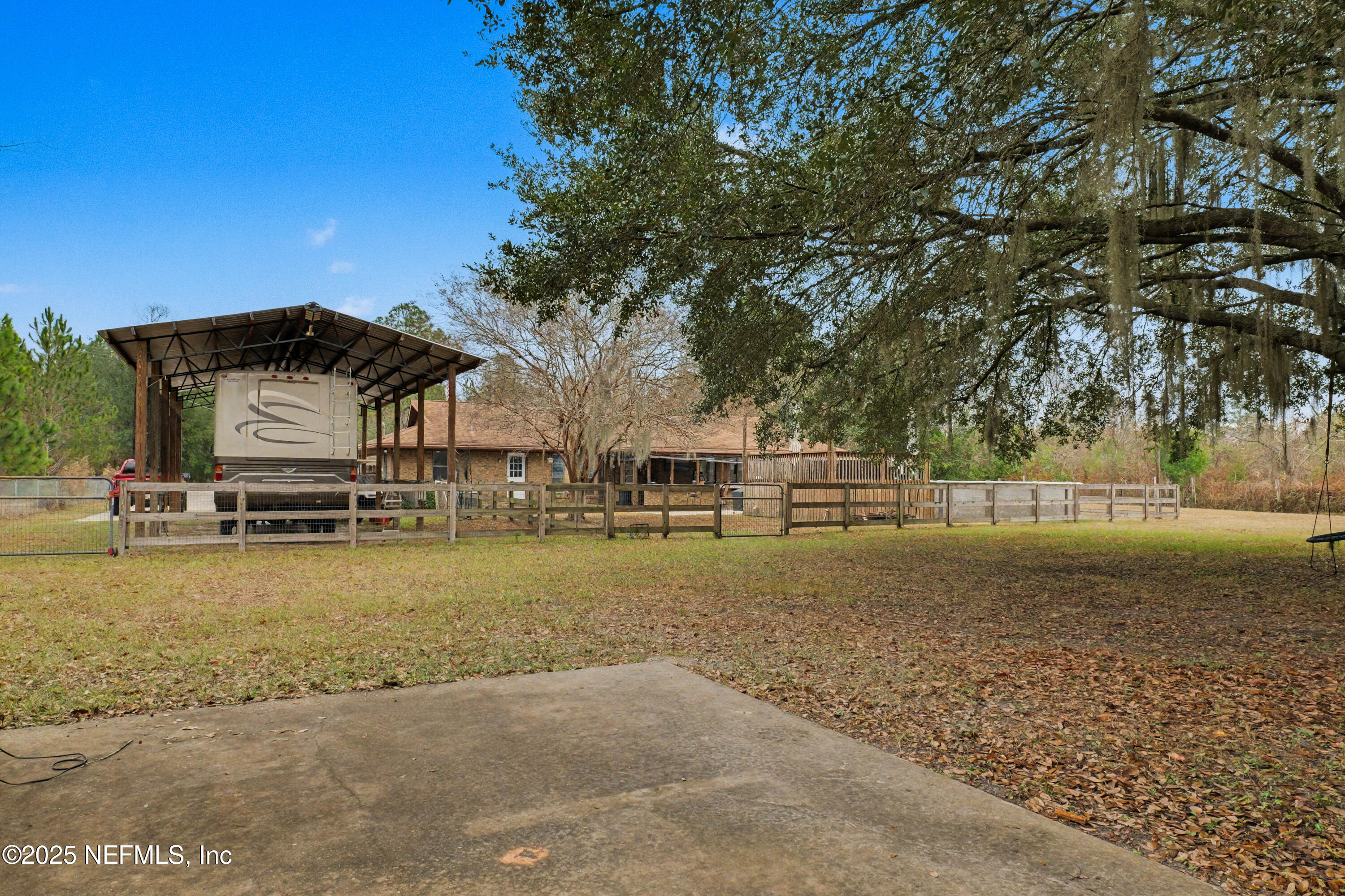 820 Golf Club Road Macclenny, FL 32063 - Photo 36 of 51 a view of a house with a yard