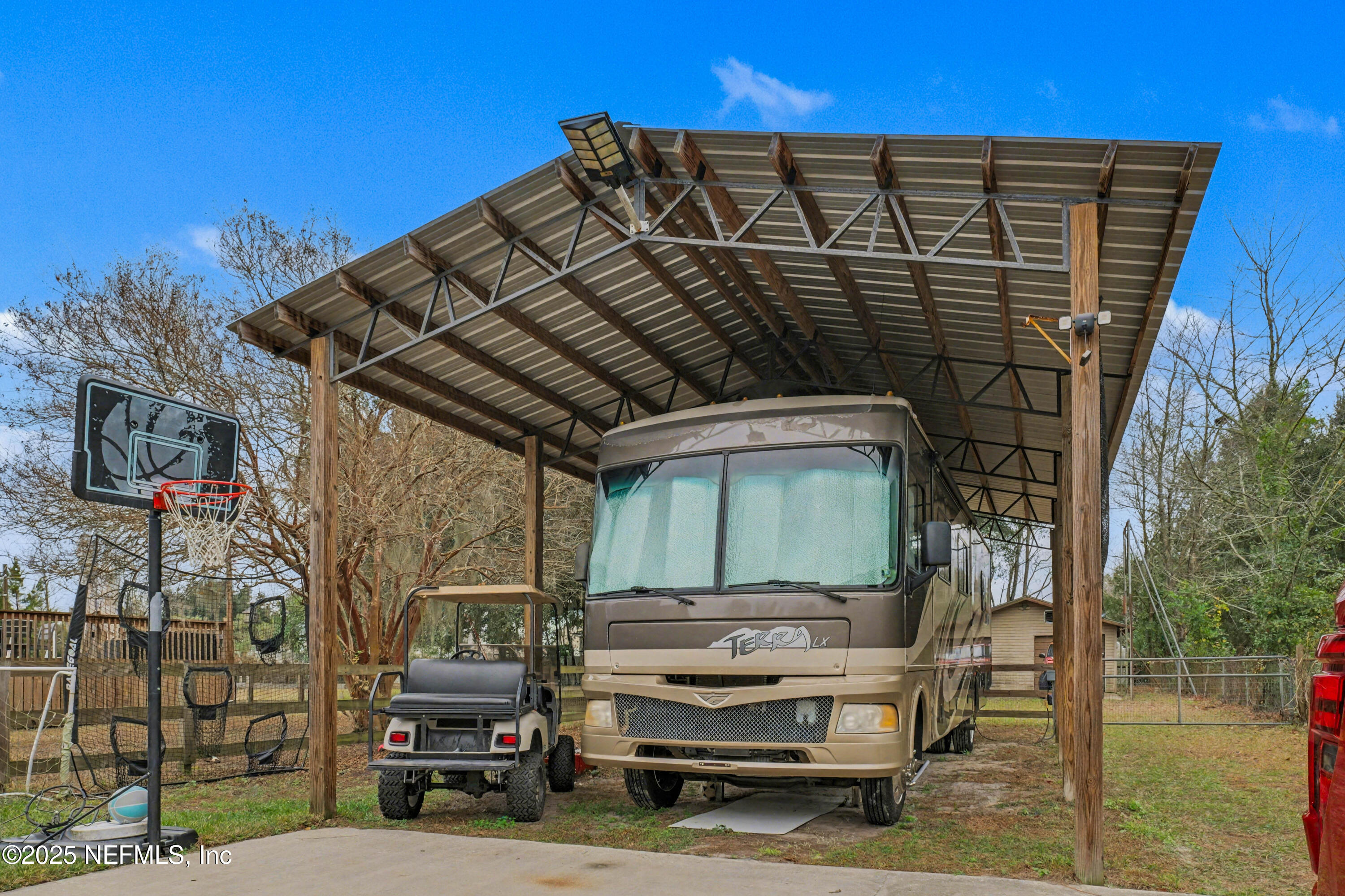 820 Golf Club Road Macclenny, FL 32063 - Photo 38 of 51 a view of a car park in front of house