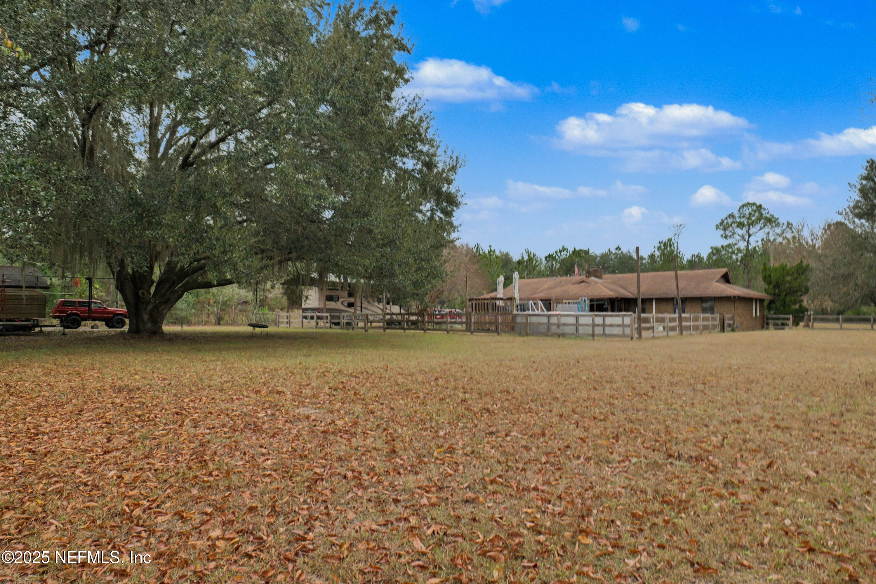 820 Golf Club Road Macclenny, FL 32063 - Photo 43 of 51 a view of outdoor space with garden and trees