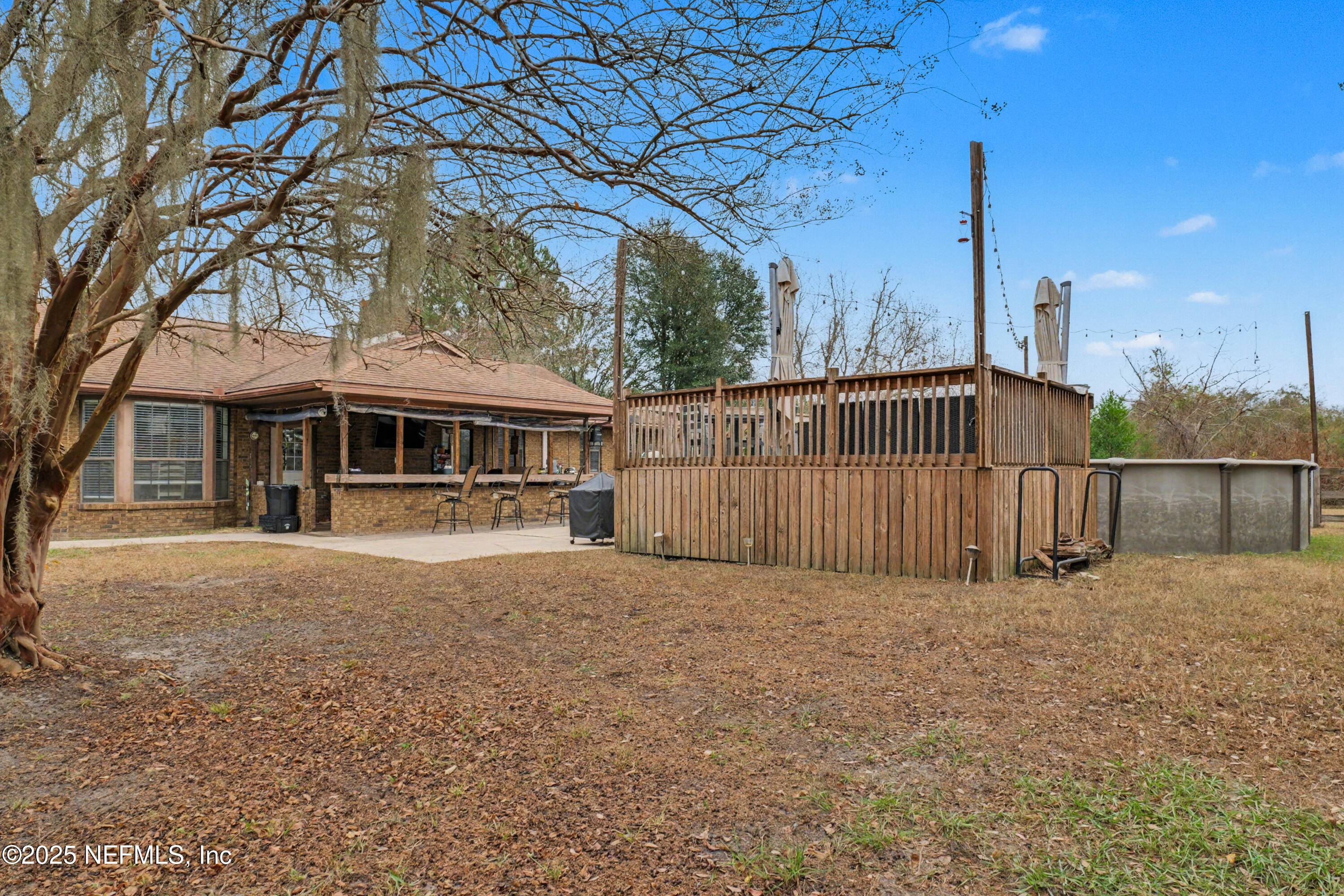 820 Golf Club Road Macclenny, FL 32063 - Photo 45 of 51 a view of a house with a yard