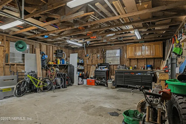 a view of a car is parked in front of a house