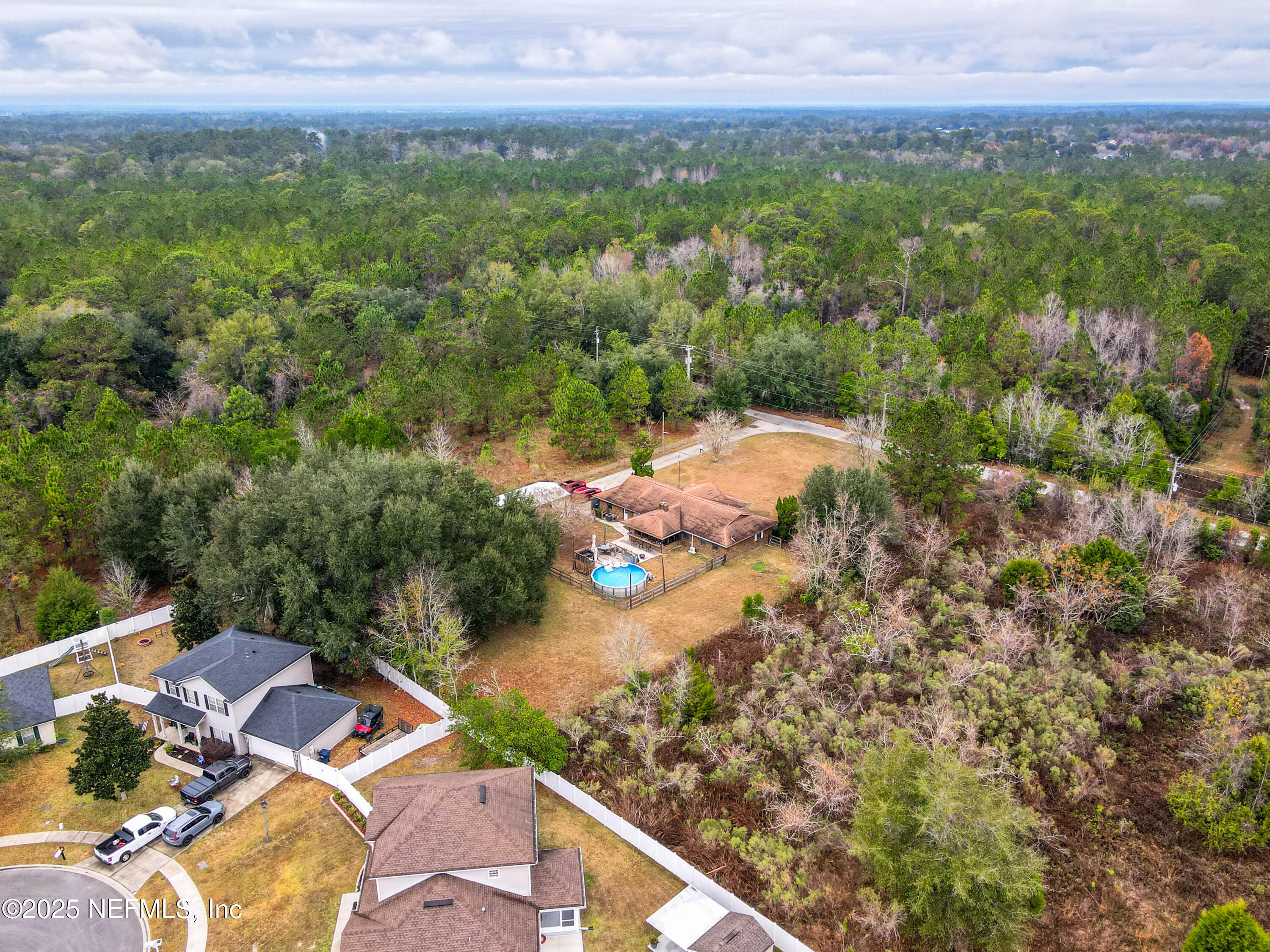 820 Golf Club Road Macclenny, FL 32063 - Photo 51 of 51 an aerial view of residential houses with outdoor space