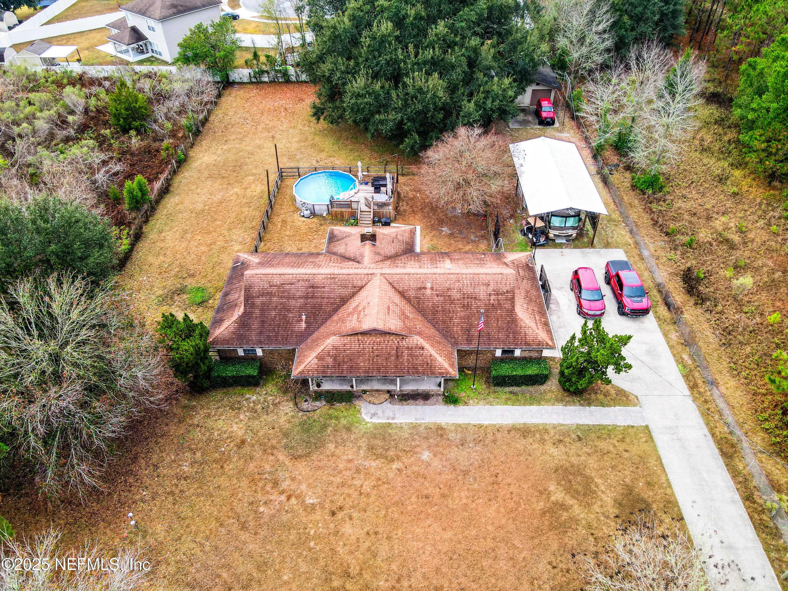 820 Golf Club Road Macclenny, FL 32063 - Photo 7 of 51 a view of swimming pool with a patio