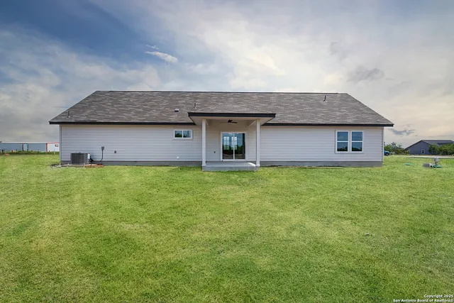 a house view with a garden space