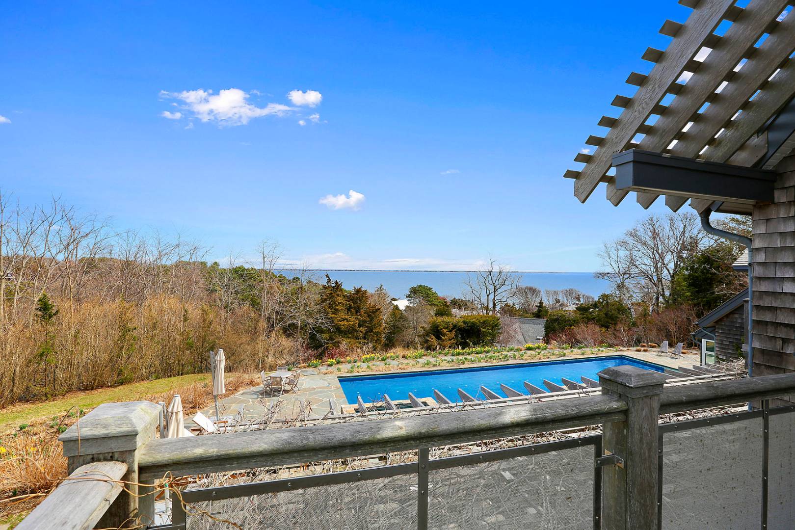 18 Knoll Road Southampton, NY 11968 - Photo 2 of 10 a view of a outdoor sitting area with furniture
