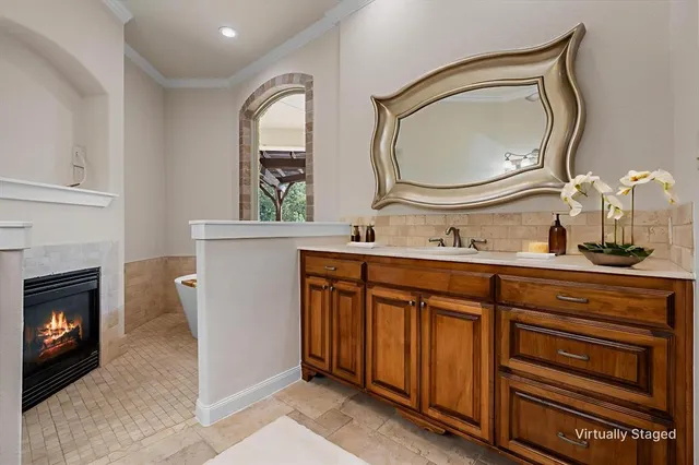 a bathroom with 2 sink and a mirror