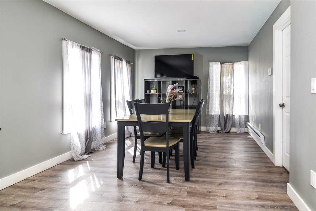136 Commonwealth Road Wayland, MA 01778 - Photo 15 of 27 a dining room with furniture and window