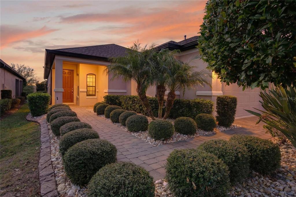 1284 Zeek Ridge Street Clermont, FL 34715 - Photo 27 of 35 a view of a house with backyard and furniture