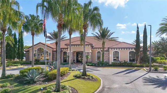 a house with palm tree in front of it