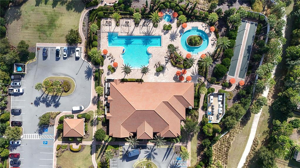 1284 Zeek Ridge Street Clermont, FL 34715 - Photo 32 of 35 an aerial view of a house yard and swimming pool