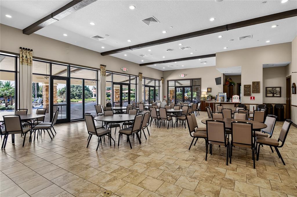 1284 Zeek Ridge Street Clermont, FL 34715 - Photo 33 of 35 a view of a dining area with furniture