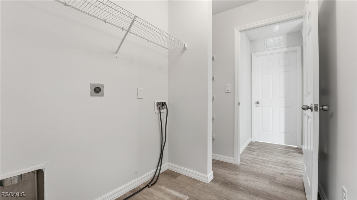 2701 East 18th Street Lehigh Acres, FL 33972 - Photo 14 of 23 a view of an empty room