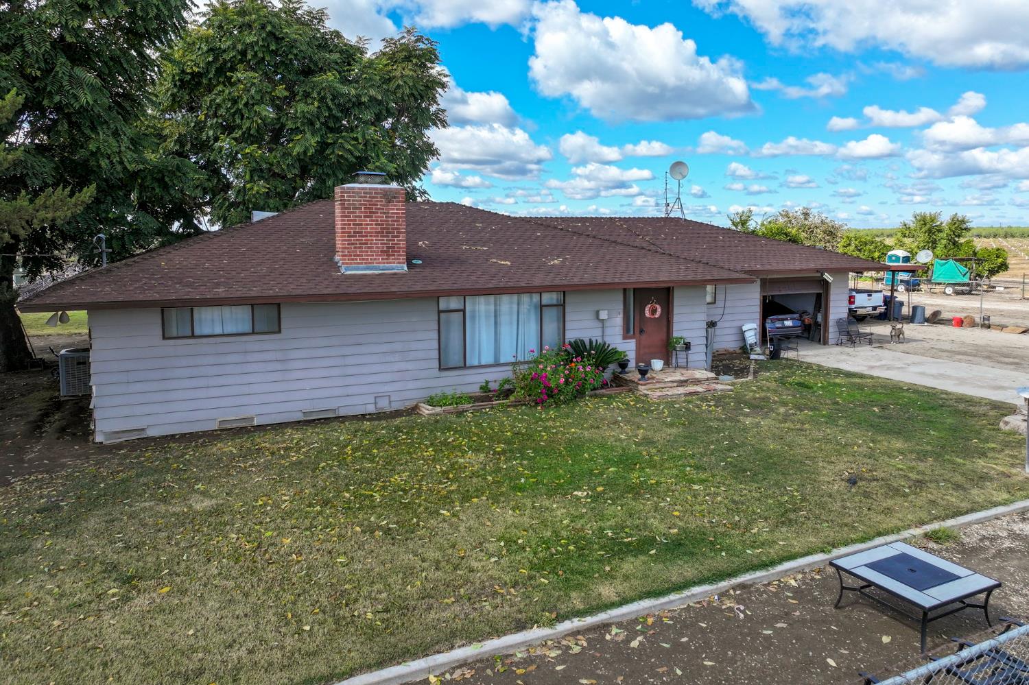 0 Road 168 Delano, CA 93215 - Photo 12 of 12 a backyard of a house with table and chairs