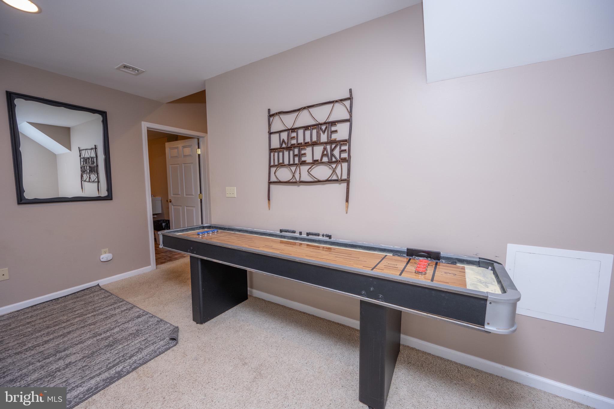 175 Roman Ridge Road, Unit 15 Oakland, MD 21550 - Photo 24 of 53 a room with pool table and window