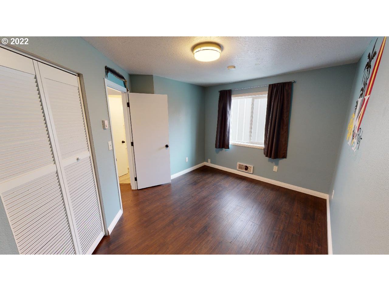 335 Mill Beach Road Brookings, OR 97415 - Photo 17 of 32 a bathroom with a sink and a mirror