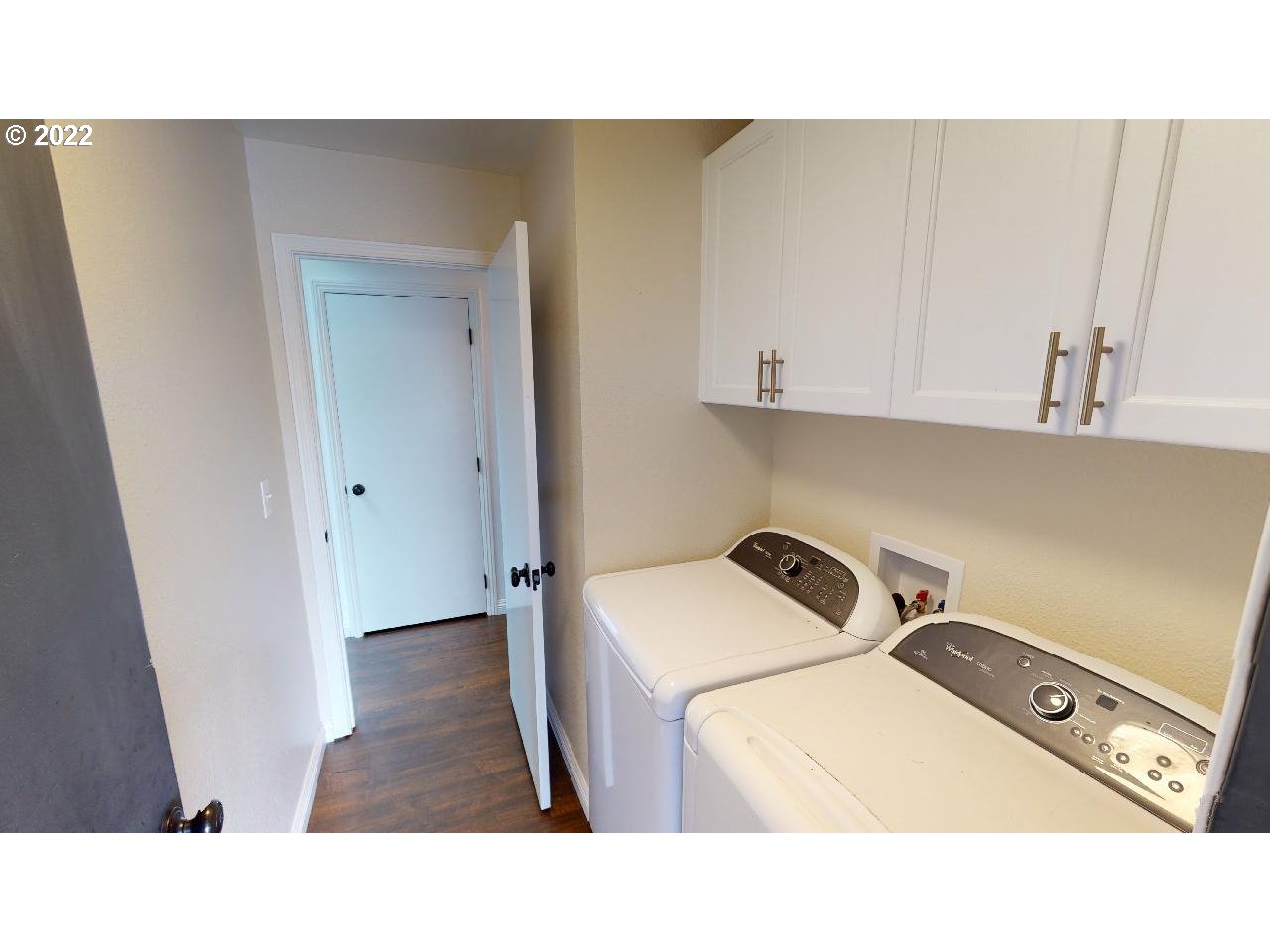 335 Mill Beach Road Brookings, OR 97415 - Photo 23 of 32 a kitchen with a sink and cabinets