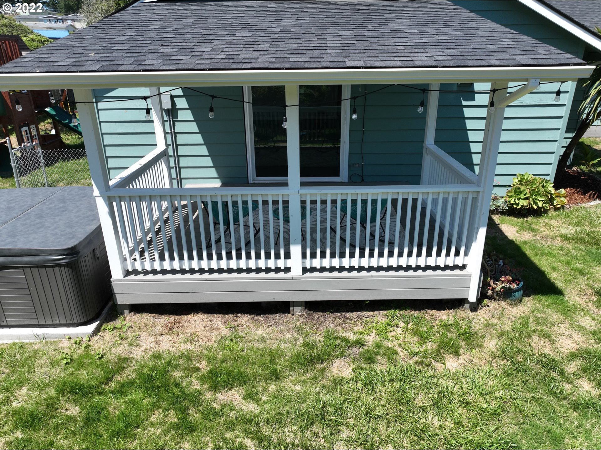 335 Mill Beach Road Brookings, OR 97415 - Photo 25 of 32 a view of a deck with a small yard